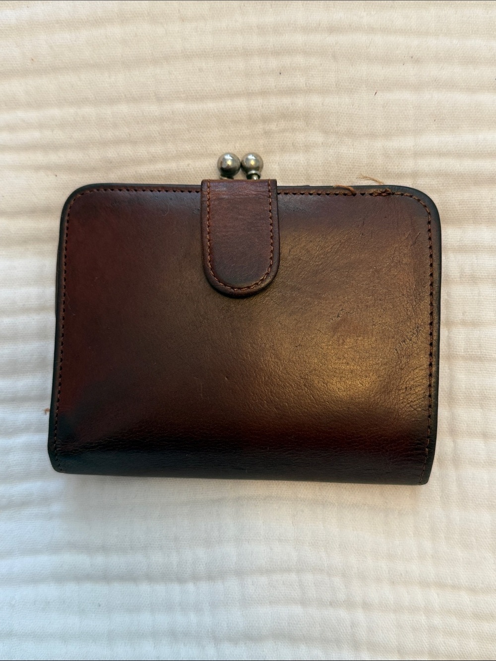 Vintage Coach Mahogany Leather Kiss Lock Bifold Wallet.